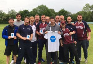 group of club cricketers showing the opening up tshirt