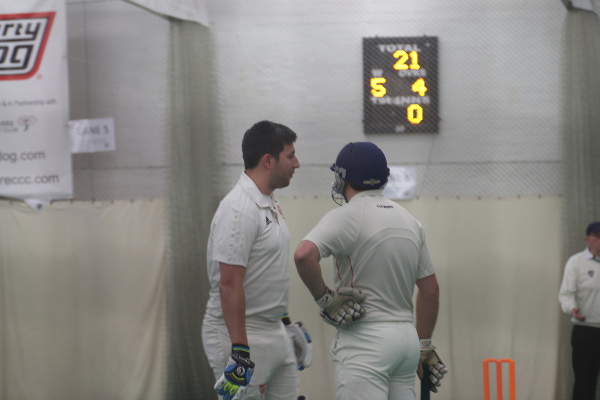 orrell red triangle batsmen talk in the middle